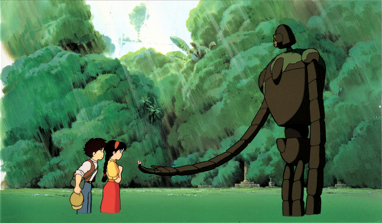 In a scene from the Anime, A beast gives a flower to the little girl 