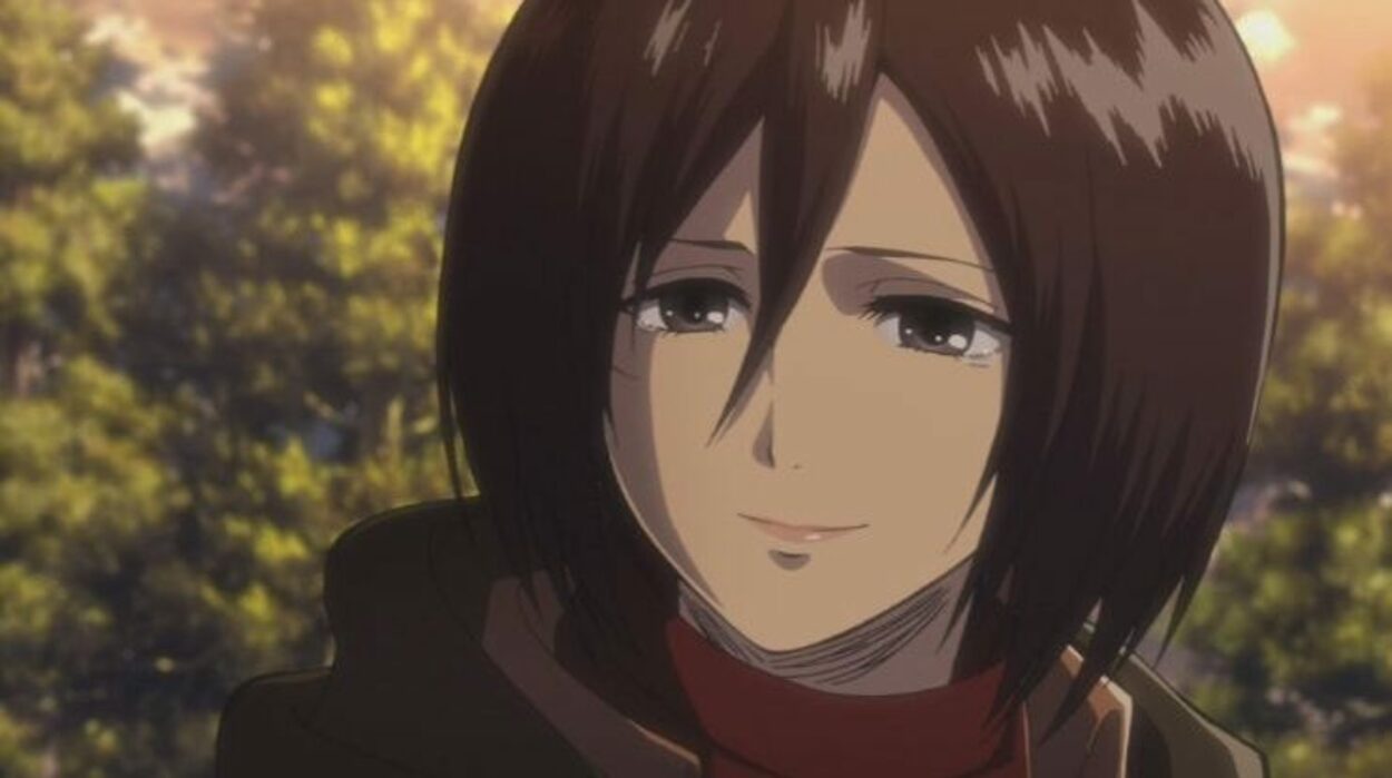 Mikasa is smiling with love and care in her eyes