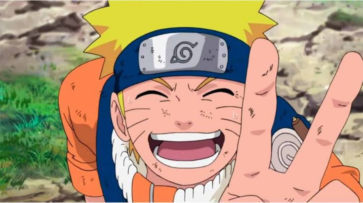 Naruto smiles with a victory sign