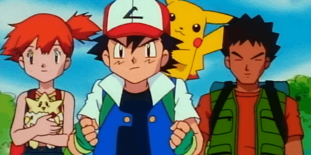 Ash with Misty and Brock along with Pikachu on his shoulder