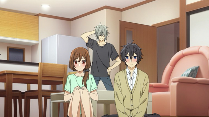 a scene from Horimiya that includes Hori and her brother and boyfriend